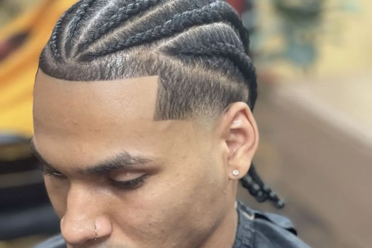 Braided hairstyle with a clean tapered hairline